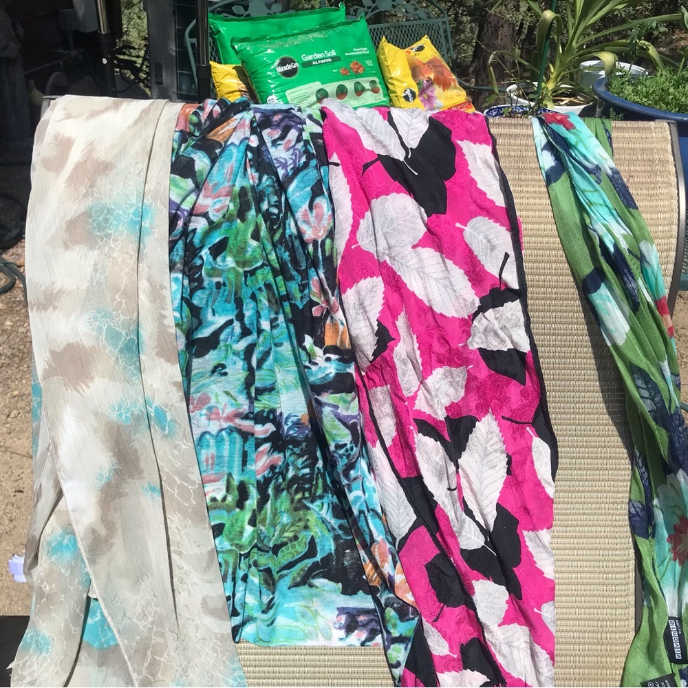4 multi-colored scarves….sold as a group.